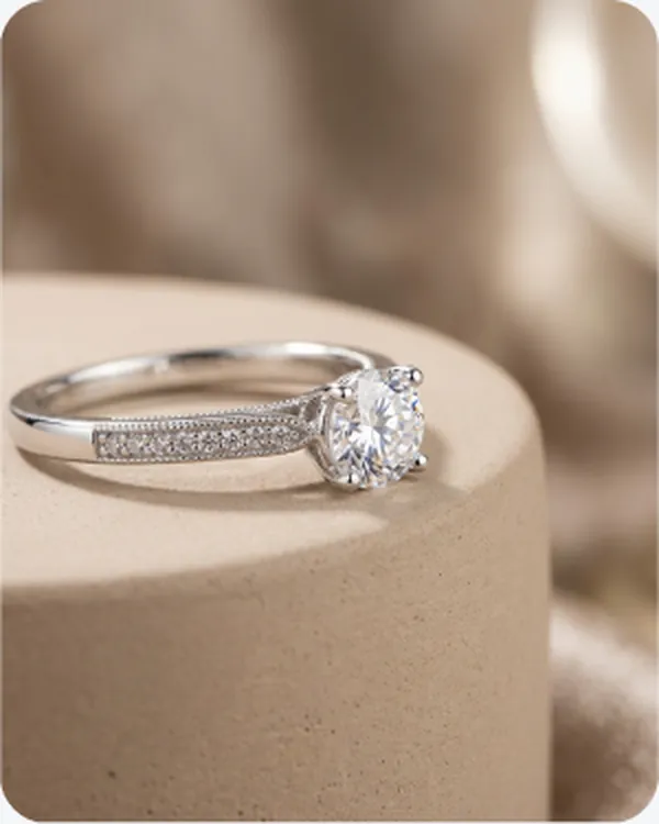 Solitaire ring on a stone pedestal